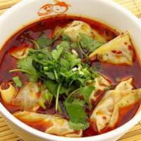 19. Wonton with Sauce · Chinese dumpling that comes with filling.