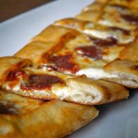 Soudjouk Pide · Mild spicy Turkish sausage with mozzarella cheese.