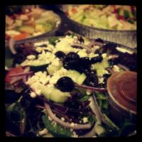 Mediterranean Salad · Mixed greens, olives, grapes, cucumber, tomato, red onions, pepperoncini, and feta cheese wi...