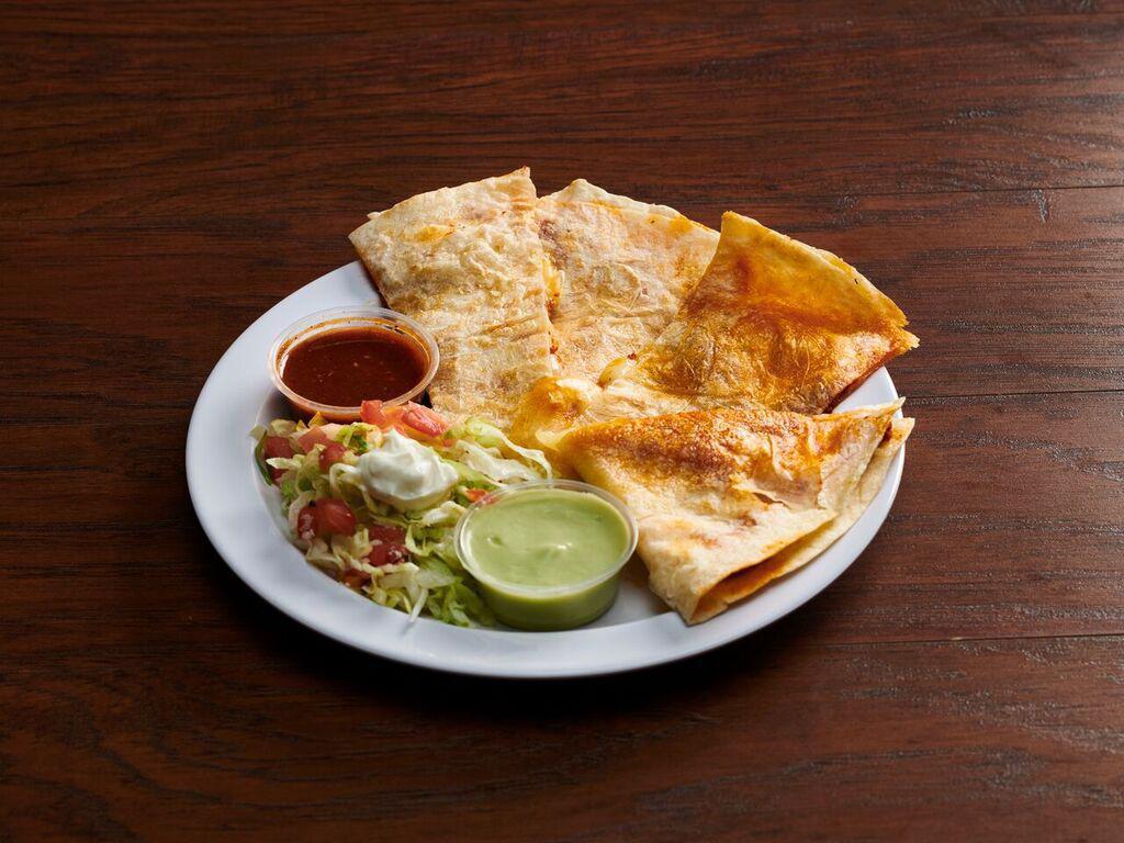 Quesadilla with Meat · Includes Monterey Jack and cheddar cheese, choice of meat in a flour tortilla.  Anything else added to this is an extra charge.