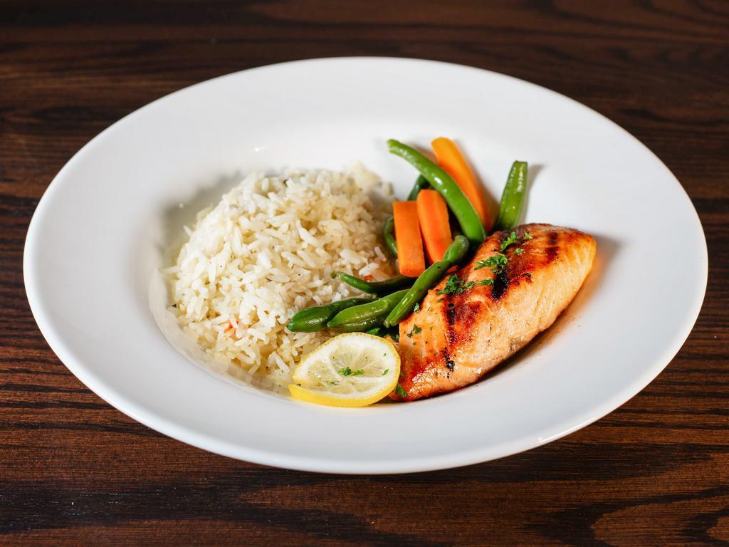 Grilled Salmon  · Filet served with seasoned rice and fresh vegetables.  Herb butter upon request.