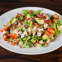 Monterey Salad · Mixed greens, grilled chicken breast, avocado, bacon, tomatoes, and crumbled blue lightly to...