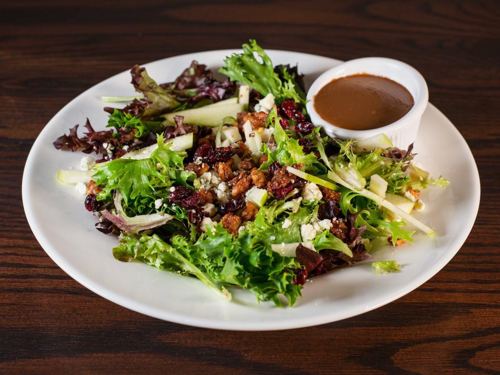 The Basin Salad · field greens, crumbled blue cheese, craisins, caramelized walnuts, Granny Smith apples. Balsamic dressing recommended


