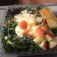 Kale Salad · Kale, apple, walnuts, dried cranberries and feta cheese with Caesar dressing.
