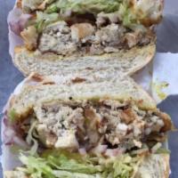 Chickenopolis Sandwich · Chicken, feta, cucumber, olive and balsamic vinaigrette on a wheat roll.