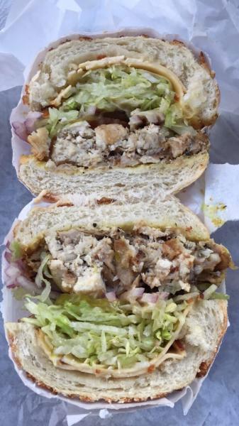 Chickenopolis Sandwich · Chicken, feta, cucumber, olive and balsamic vinaigrette on a wheat roll.