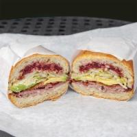 My Favorite Sandwich · Pastrami, bacon, avocado, cranberry jelly, cream cheese, mayo, onion, and lettuce on a sourd...