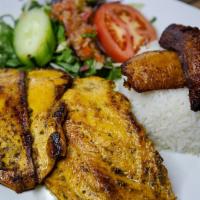 Pechuga a la Plancha · Grilled chicken breast. Served with rice, sweet plantains, and a side green salad.