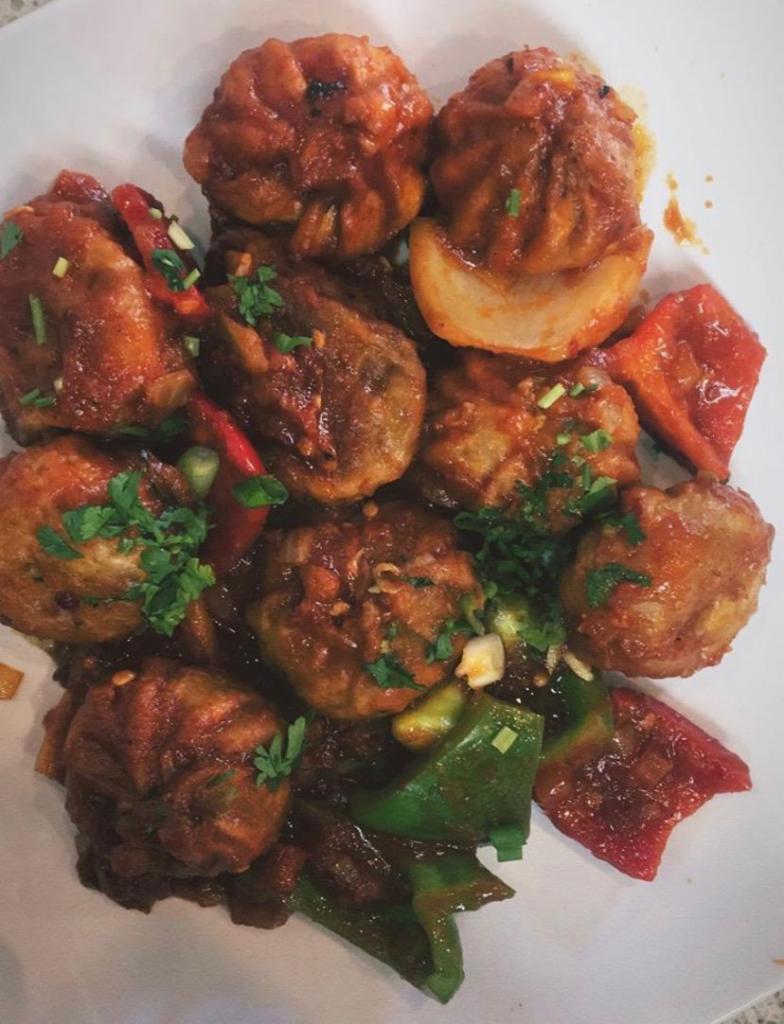 C-Momo Chicken · Momo sauteed with onion, bell pepper, red chili and Szechuan pepper. 