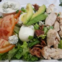 Cobb Salad · Assortment of hand washed lettuces, sliced tomatoes, hard boiled sliced egg, bacon bits, smo...