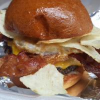 Brunch Burger · Freshly ground brisket & sirloin blend, with mayonnaise, cheddar cheese, 2 pieces of bacon, ...