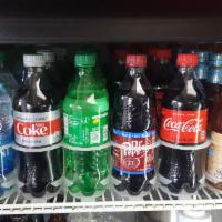 20 oz. Bottle Soda · Coke products.