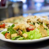 Caesar Salad · Crispy romaine lettuce, croutons, cherry tomatoes, parmesan cheese, and Caesar dressing. Ext...