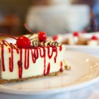 Cheesecake · Served with your choice of toppings.
