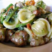 Orecchiette Con Rabe · Ear shaped pasta with broccoli rabe and sun dried tomatoes