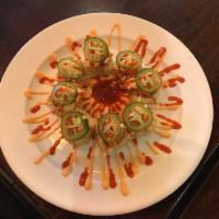 11. Super Volcano · Deep-fried spicy tuna roll, spicy salmon, jalapeno with chef's special spicy sauce.
