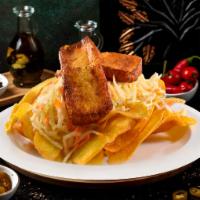 Tajadas con Queso · Fried green plantain and fried cheese with house salad.