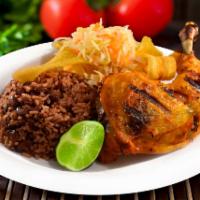 Pollo Asado · Grilled chicken (leg quarter) served with gallo pinto ( rice and beans), green fried plantai...