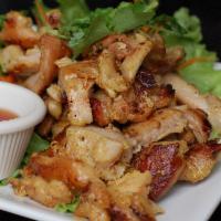 54. Kai Yang · Grilled marinated chicken served with sweet sauce.