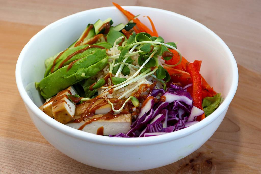 Bap Bowl / Wrap · Jasmine brown rice, marinated tofu (aminos, ACV, garlic, tamari, paprika), avocado, mixed greens, carrots, cabbage, red bell pepper, cucumber, sprouts. Sriracha miso dressing. Available as a grain bowl or in a raw spinach, gluten-free wrap.