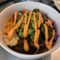 Nourish Savory Brekkie Bowl · Warm jasmine brown rice, carrots, avocado, roasted broccoli and/or cauliflower, roasted mush...