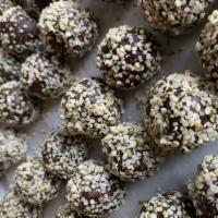 Protein Ball (GF) · Almonds, walnuts, dates, hemp seeds, cacao, vanilla, spirulina, sea salt. Gluten-free.