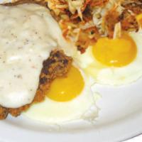 Country Fried Steak and Eggs · 2 large eggs served with tender country-fried steak smothered with our rich and creamy peppe...