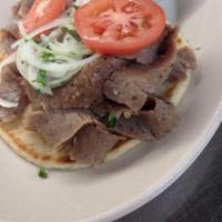 Original Gyros Sandwich · Sliced gyros meat on pita bread with onions, tomatoes, and tzatziki sauce.