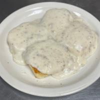 Biscuits and Gravy · Hot buttermilk biscuits freshly baked and smothered with rich creamy peppered sausage gravy. 