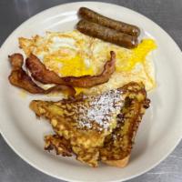 #3 Combo · Small chilled juice, 2 half slices of French toast, 2 fresh eggs, 2 strips of bacon, and sau...