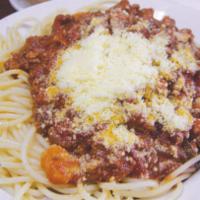 Italian Spaghetti · A hearty portion topped with homemade meat sauce and served with garlic bread.