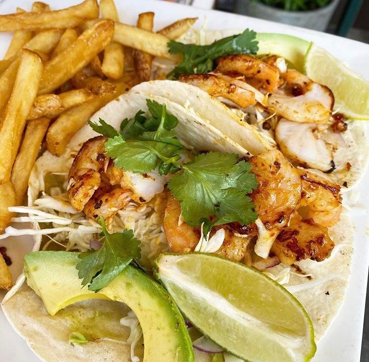 Fish or Shrimp Tacos (2) · Fish or shrimp. Seasoned cod, cabbage salad, cilantro, avocado, spicy serrano pepper sauce.