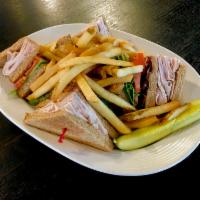 Ticket’s Club Sandwich · Turkey or ham. Layered with bacon, lettuce, tomato and mayo. Choice of bread.