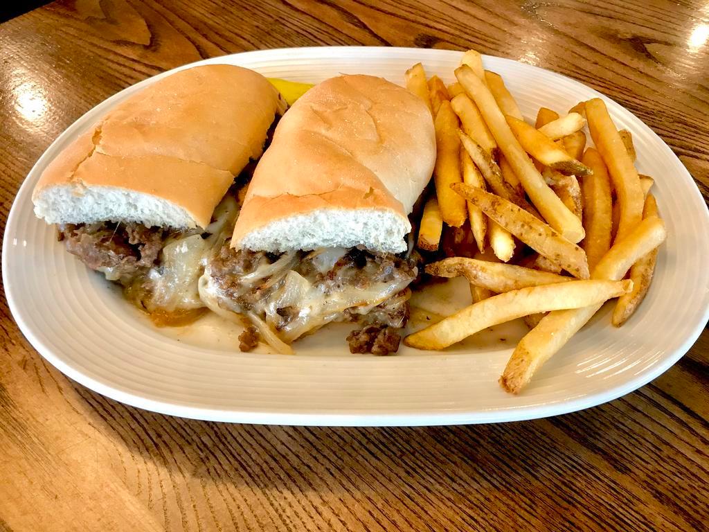 Philly Cheese Steak Sandwich · Shaved steak, mushrooms, onions, mozzarella, French roll.