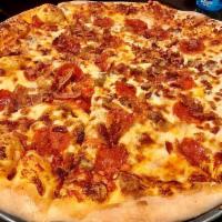 Meat Lovers Pizza · Mozzarella, chourico, sausage, bacon and pepperoni.
