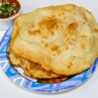 Paneer Paratha · Grilled paratha stuffed with paneer (home made Indian cheese) and spices. Served with yogurt...
