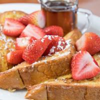 Fresh Strawberry French Toast · Our cafe French toast topped with fresh strawberries, dusted with powdered sugar and topped ...