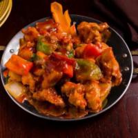 Chili Chicken (Dry) · Chicken sauteed with green chilies, soy-ginger flavor.