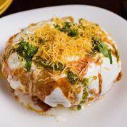 Raj Kachori Chaat · Round fried ball made of flour and dough filled with veg stuffing, covered with yogurt and c...
