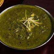 Saag Paneer · Creamed spinach and cheese, garden herbs.