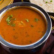 Goan Fish Curry · Tamarind & coconut gravy, curry leaves, fish.