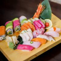 Sushi and Sashimi Combo For 2 · 18 piece. Chef choice sashimi, 10 piece nigiri and 1 specialty roll,  and 2 salads.