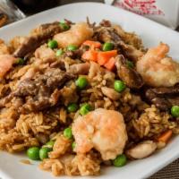 House Fried Rice · chicken, shrimp beef and vegetables