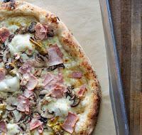 Capricciosa Pizza · Mushroom, artichoke, prosciutto cotto, bufala.