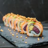 Wasabi Shoyu Roll · Tuna, Mango topped with Salmon, Avocado and our Ginger Wasabi Soy Sauce. 
8 pieces per order 
