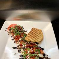 Caprese Salad Lunch  · Mixed greens, fresh mozzarella, plum tomato, basil, balsamic reduction, and virgin olive oil. 