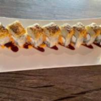 Dynamite Roll · In: shrimp tempura, cream cheese, spicy crab Out: torched crab cake, eel sauce and spicy sau...