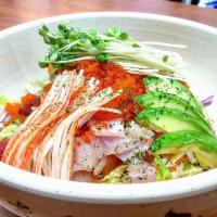 Korean Chirashi · Rice with mix vegetables and sashimi with a red spicy sauce on the side with white rice. Ser...