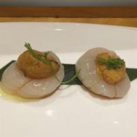 Scallop and Sea Urchin · With Japanese basil, sea salt and yuzu dressing.