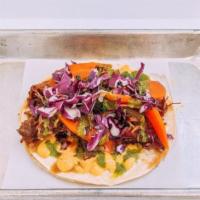 LUCY TACO · Lemongrass Braised Pork, Escabeche (Pickled Carrot & Jalapeno), Aji Aioli, Ginger Chimi, & R...